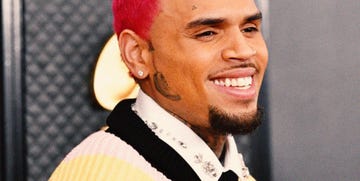 chris brown smiles at the grammy awards