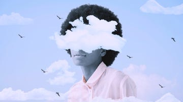 woman with head in clouds
